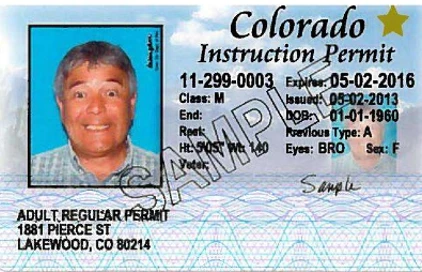 Man with gold star on colorado driver's license