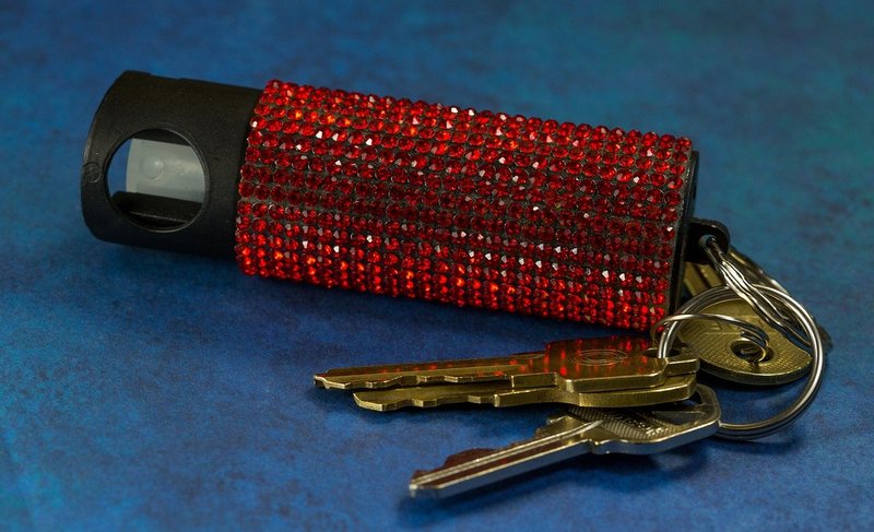 A keychain with pepper spray on it - Can you bring pepper spray on a plane?
