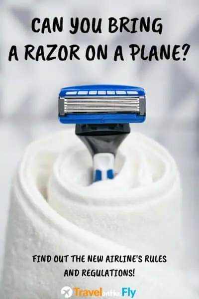 Shaving razor wrapped in a white towel